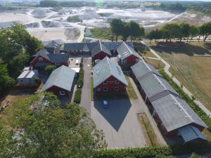 an overhead view of a farm with red buildings at Udsigten Faxe in Faxe