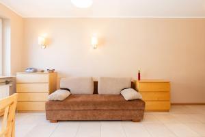 Posteľ alebo postele v izbe v ubytovaní Spacerowa Apartments with Parking by Noclegi Renters