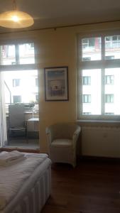 מיטה או מיטות בחדר ב-Lichtdurchflutetes Apartment Prenzlauerberg