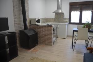 A kitchen or kitchenette at Apartamento Almanzor