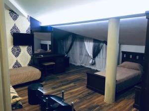 Postel nebo postele na pokoji v ubytování Vival Hotel