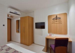 TV a/nebo společenská místnost v ubytování Hotel Leafio-Near Airport