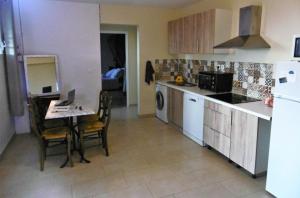 A kitchen or kitchenette at Mango Trees