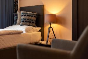 Postel nebo postele na pokoji v ubytování Hotel Na Vývoji