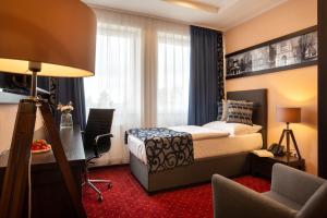 Postel nebo postele na pokoji v ubytování Hotel Na Vývoji
