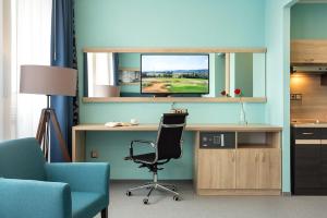 Kuchyň nebo kuchyňský kout v ubytování Hotel Na Vývoji