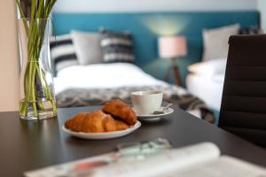 Postel nebo postele na pokoji v ubytování Hotel Na Vývoji