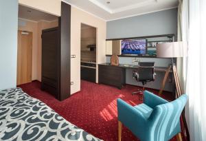 TV a/nebo společenská místnost v ubytování Hotel Na Vývoji