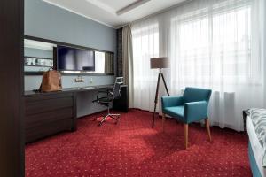 TV a/nebo společenská místnost v ubytování Hotel Na Vývoji