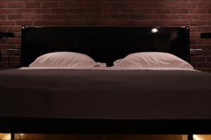Ένα ή περισσότερα κρεβάτια σε δωμάτιο στο Andromeda Hotel Thessaloniki