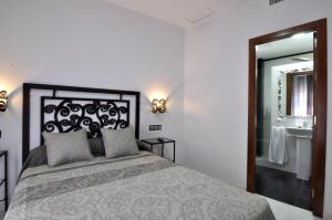 Voodi või voodid majutusasutuse Hostal Almanzor toas
