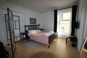 Postel nebo postele na pokoji v ubytování BIT apartments
