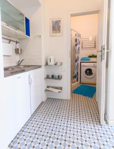 Kuchyňa alebo kuchynka v ubytovaní Rental Apartments Poznańska