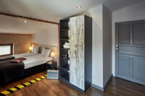 מיטה או מיטות בחדר ב-Loft Piotrkowska by Good Time