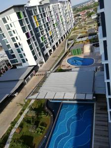 an aerial view of a apartment complex with a swimming pool at Vivacity jazz suite 3 condo 139 in Kuching