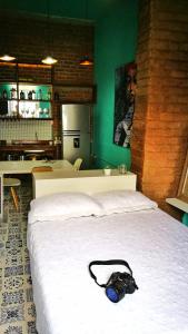 Ένα ή περισσότερα κρεβάτια σε δωμάτιο στο Moonshine Boutique Hostal