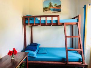 Postel nebo postele na pokoji v ubytování Tres Islas Hostel + 37 fotografií