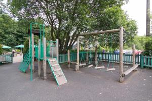an empty playground with swings and a slide at The Keelman and Big Lamp Brewery in Newcastle upon Tyne