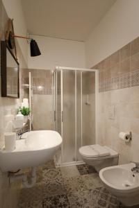 Koupelna v ubytování InGarda Rooms
