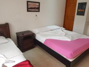 Postel nebo postele na pokoji v ubytování Artur Hostel
