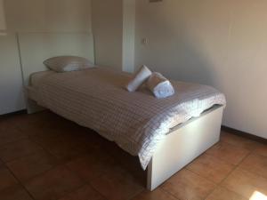 Voodi või voodid majutusasutuse Albergo Ristorante Belcantone toas