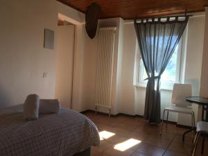 Voodi või voodid majutusasutuse Albergo Ristorante Belcantone toas
