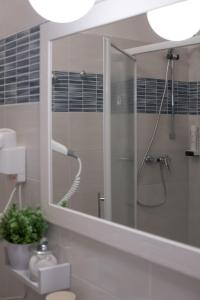 Koupelna v ubytování InGarda Rooms