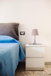 Uma cama ou camas num quarto em Ostiense District B&B