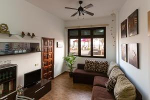Posezení v ubytování Apartamento a pie de playa