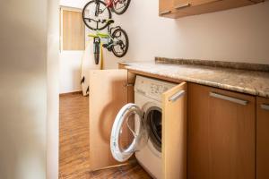 Kuchyň nebo kuchyňský kout v ubytování Apartamento a pie de playa