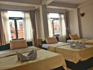 Ένα ή περισσότερα κρεβάτια σε δωμάτιο στο Hotel Yala Peak