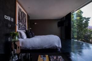 Voodi või voodid majutusasutuse Demetria Hotel toas