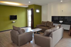TV a/nebo společenská místnost v ubytování Riverview Hotel
