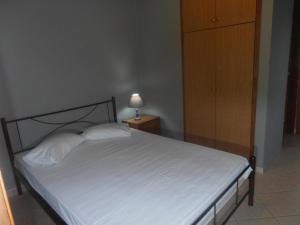 Posteľ alebo postele v izbe v ubytovaní Melia