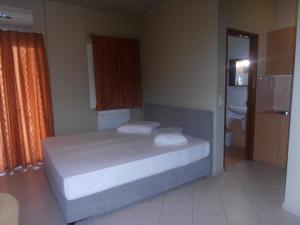 Posteľ alebo postele v izbe v ubytovaní Melia