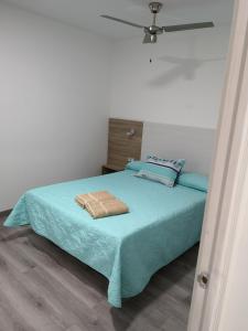 Ένα ή περισσότερα κρεβάτια σε δωμάτιο στο Apartamento la piedra viva 1 arinaga