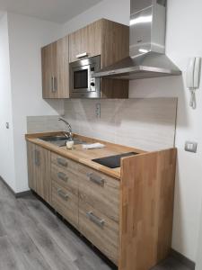 Η κουζίνα ή μικρή κουζίνα στο Apartamento la piedra viva 1 arinaga