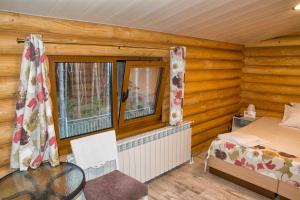 Postel nebo postele na pokoji v ubytování Jack Family Hotel