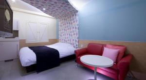 Кровать или кровати в номере Hotel Glow Yokkaichi (Adult Only)