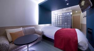 Кровать или кровати в номере Hotel Glow Yokkaichi (Adult Only)