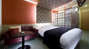 Кровать или кровати в номере Hotel Glow Yokkaichi (Adult Only)
