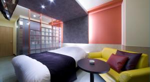 Гостиная зона в Hotel Glow Yokkaichi (Adult Only)