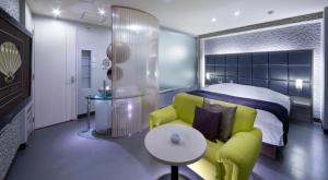 Гостиная зона в Hotel Glow Yokkaichi (Adult Only)