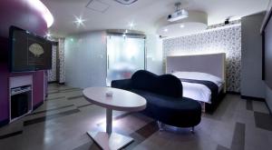 Кровать или кровати в номере Hotel Glow Yokkaichi (Adult Only)