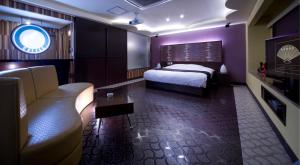 Кровать или кровати в номере Hotel Glow Yokkaichi (Adult Only)