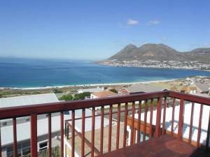 a view from a balcony overlooking the ocean at Simonsview in Simonʼs Town