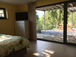 Ένα ή περισσότερα κρεβάτια σε δωμάτιο στο Haagalm Terrasse, Garten