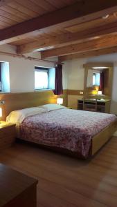 Postel nebo postele na pokoji v ubytování Hotel Edelweiss