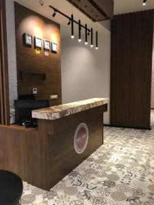 a lobby of a hotel with a reception desk at Iveria in Batumi