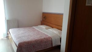 Postel nebo postele na pokoji v ubytování Hotel Edelweiss